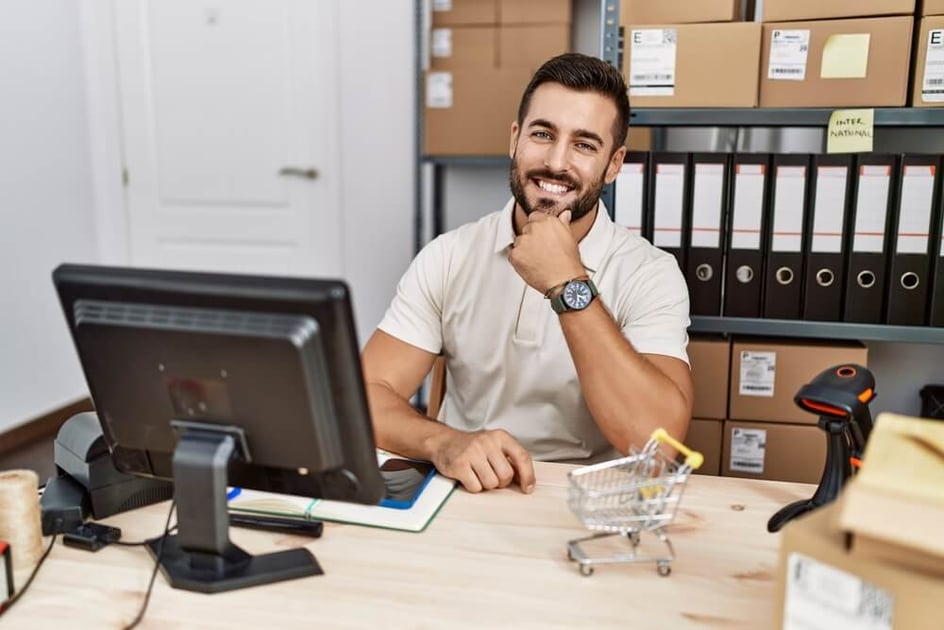 Happy business owner working with a PEO. 