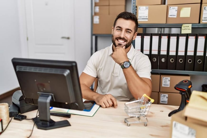 Happy business owner working with a PEO. 